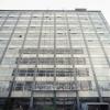 Uni Stuttgart: Verfugung der Fenster unter Verwendung der Kn�dler Fassaden-Arbeitsb�hne Typ Sky Climber